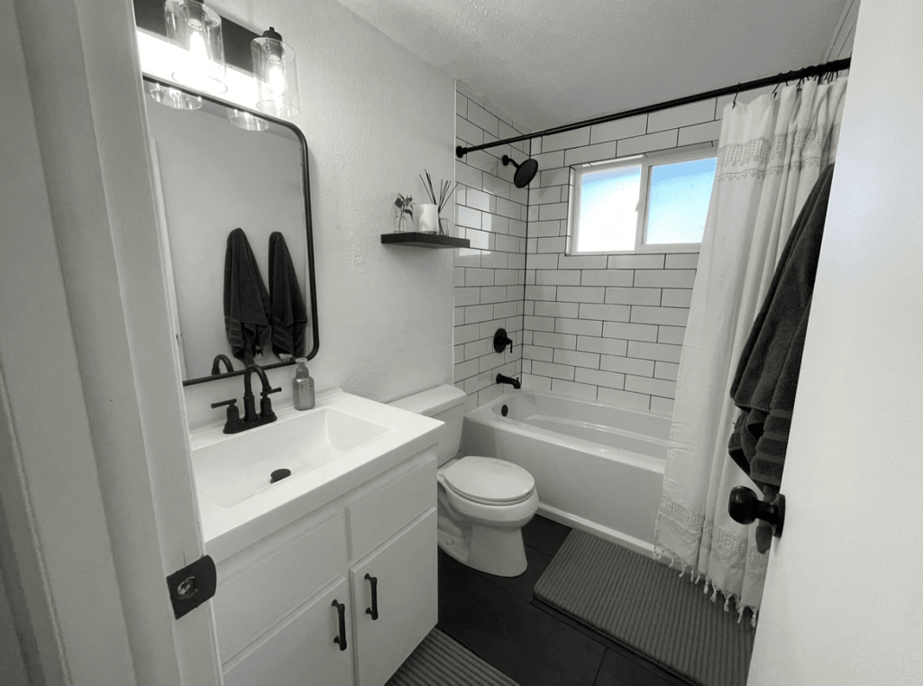 Custom bathroom remodel in Loveland, CO with modern tile shower and tile floor. Custom bathroom remodel in Loveland, CO with modern tile shower and tile floor.